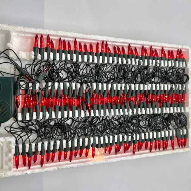 Compra SERIE SIN FLOR CORDON VERDE, ROJA 140 LUCES